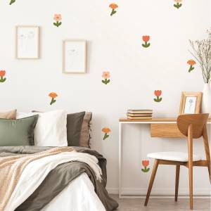 Färgglad väggdekor med blomsterdesign på en ljus bakgrund, perfekt för barnrum.
