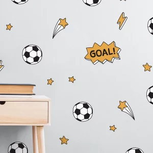 Väggdekor för barn med fotbollsdesign och stjärnor, perfekt för att skapa en lekfull och inspirerande miljö i barnerummet. Decorera med motiv som fotbollar och texten GOAL! för en sportig atmosfär.